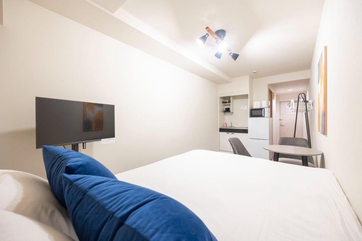 Shinjuku Okada Building Apartman Tokió Szoba fotó