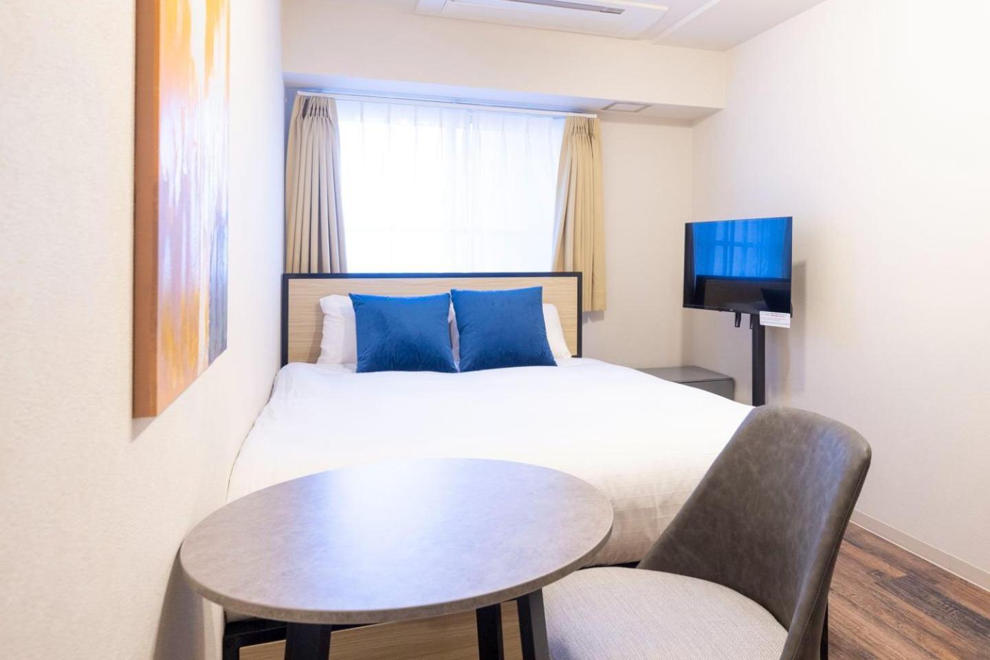 Shinjuku Okada Building Apartman Tokió Szoba fotó