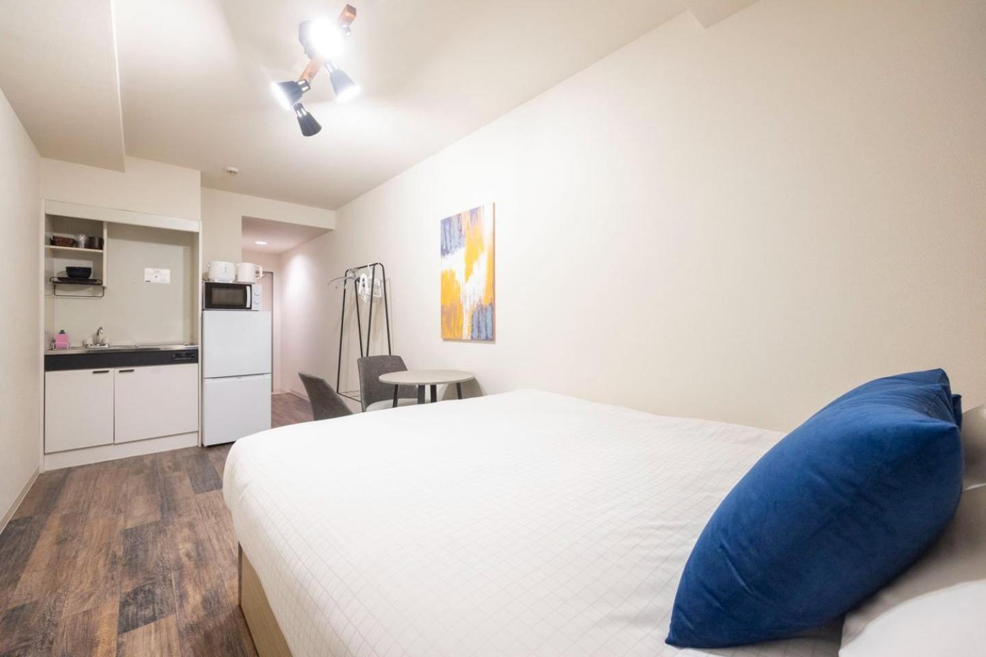 Shinjuku Okada Building Apartman Tokió Szoba fotó