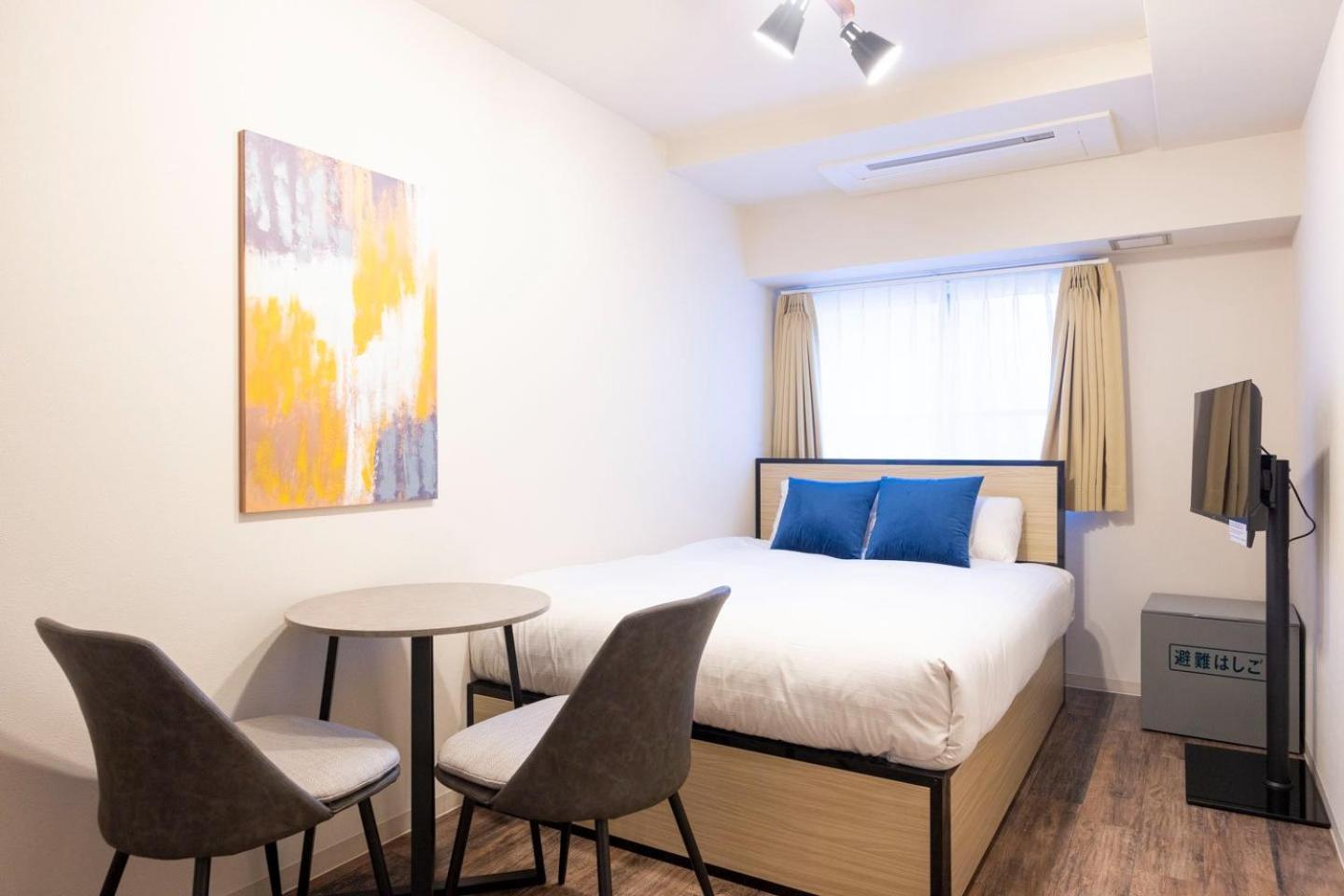 Shinjuku Okada Building Apartman Tokió Szoba fotó