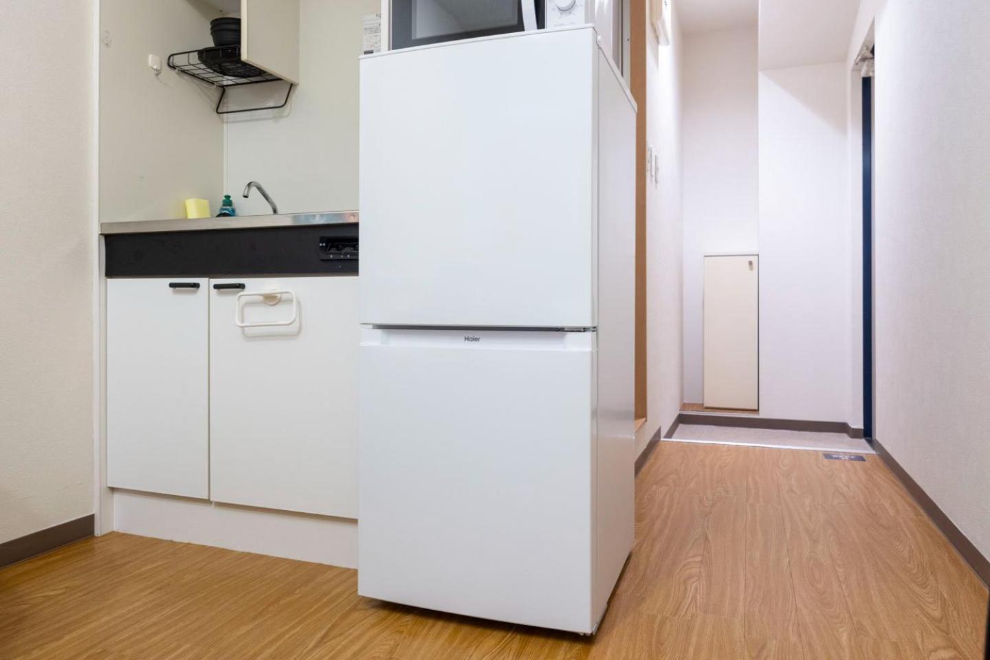 Shinjuku Okada Building Apartman Tokió Szoba fotó