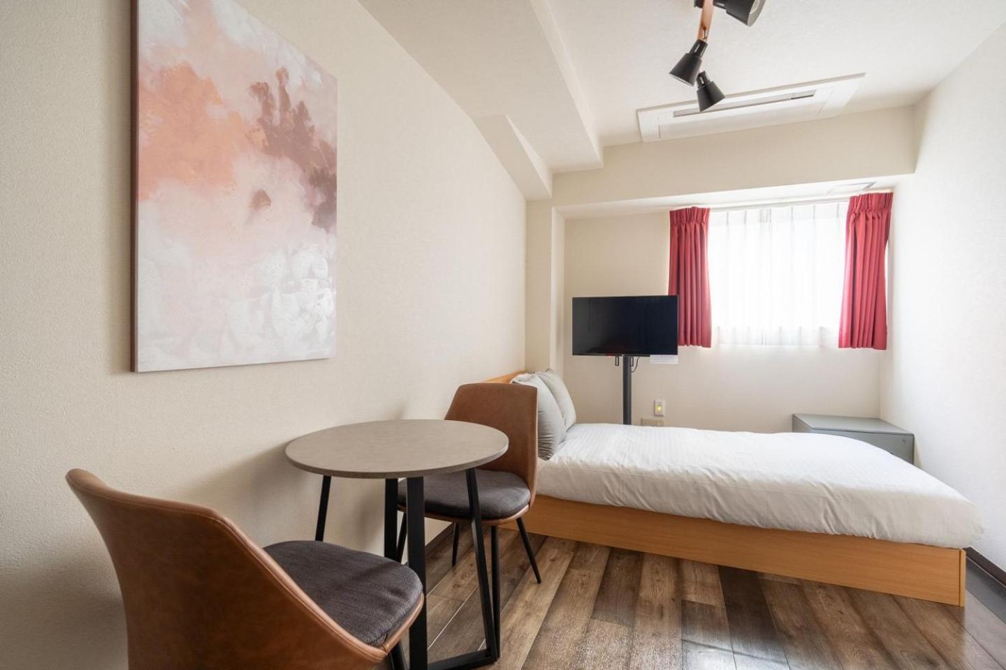 Shinjuku Okada Building Apartman Tokió Szoba fotó