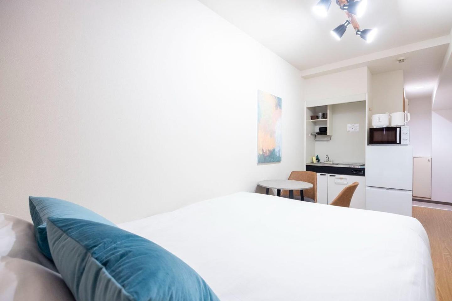 Shinjuku Okada Building Apartman Tokió Szoba fotó