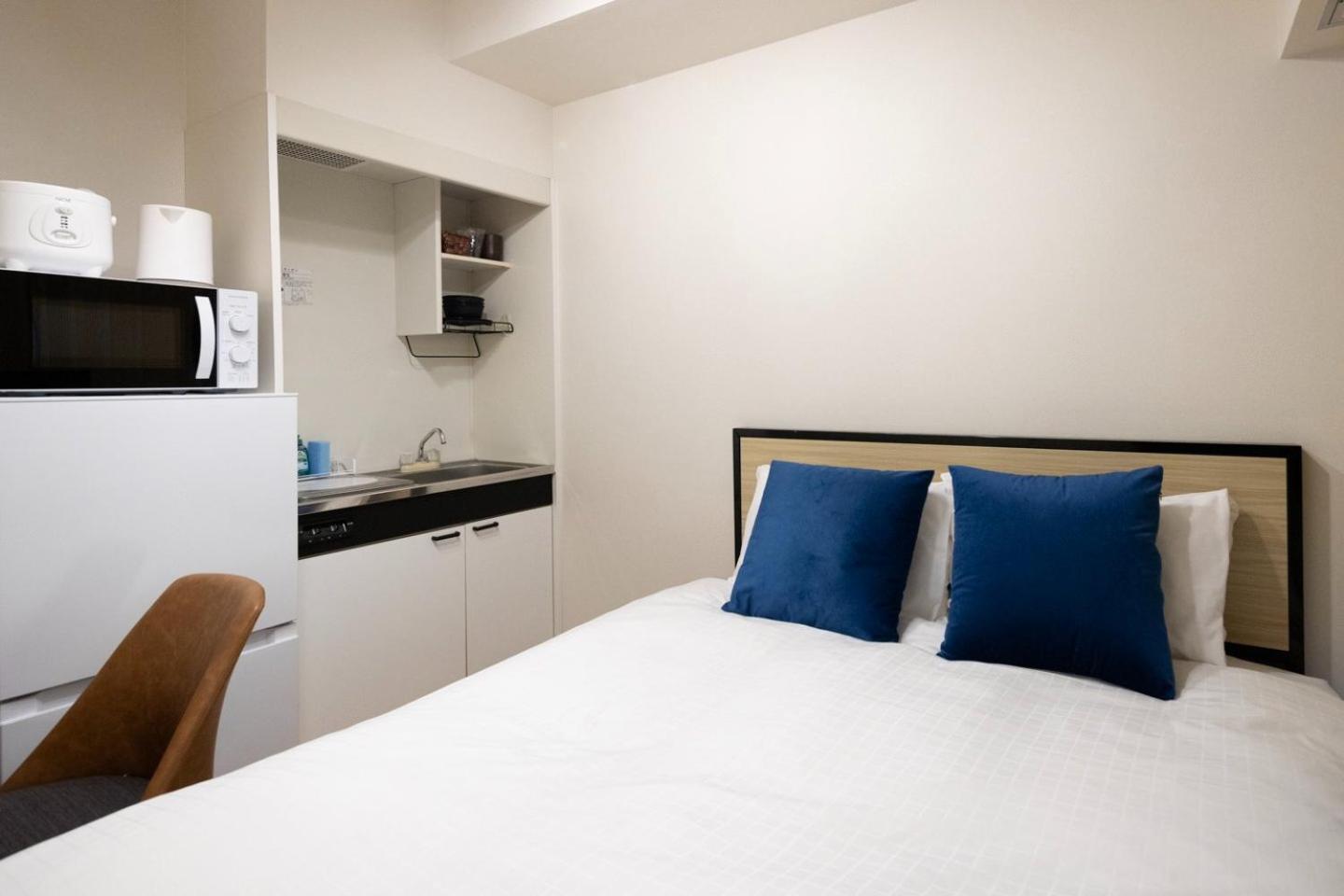 Shinjuku Okada Building Apartman Tokió Szoba fotó