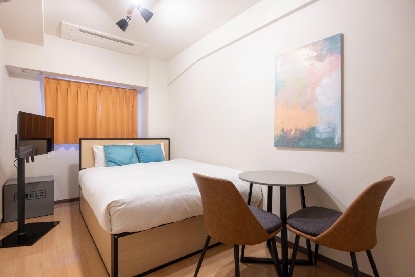 Shinjuku Okada Building Apartman Tokió Szoba fotó