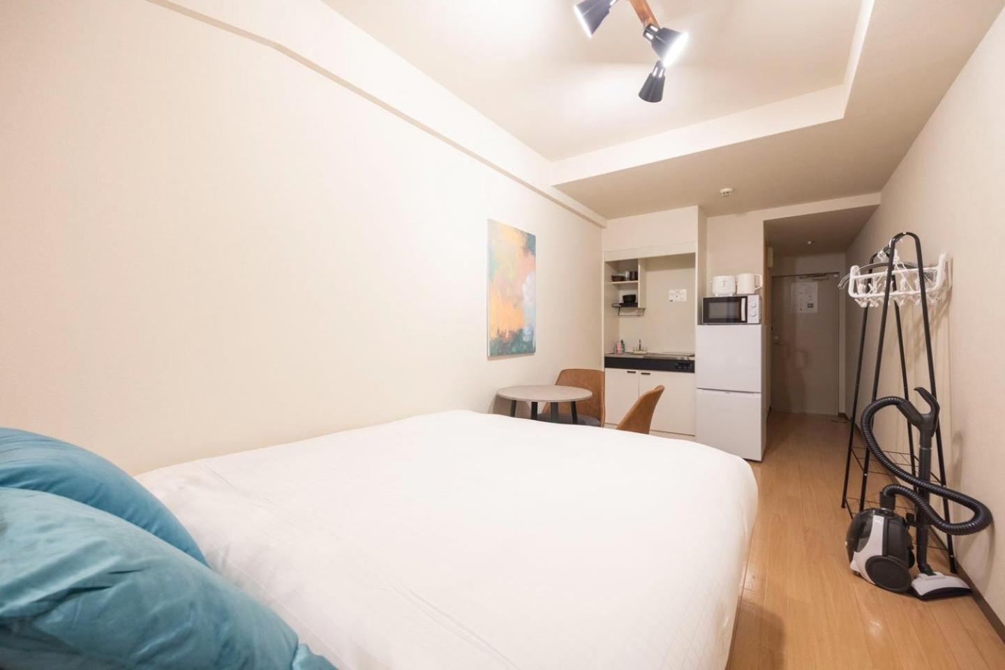 Shinjuku Okada Building Apartman Tokió Szoba fotó