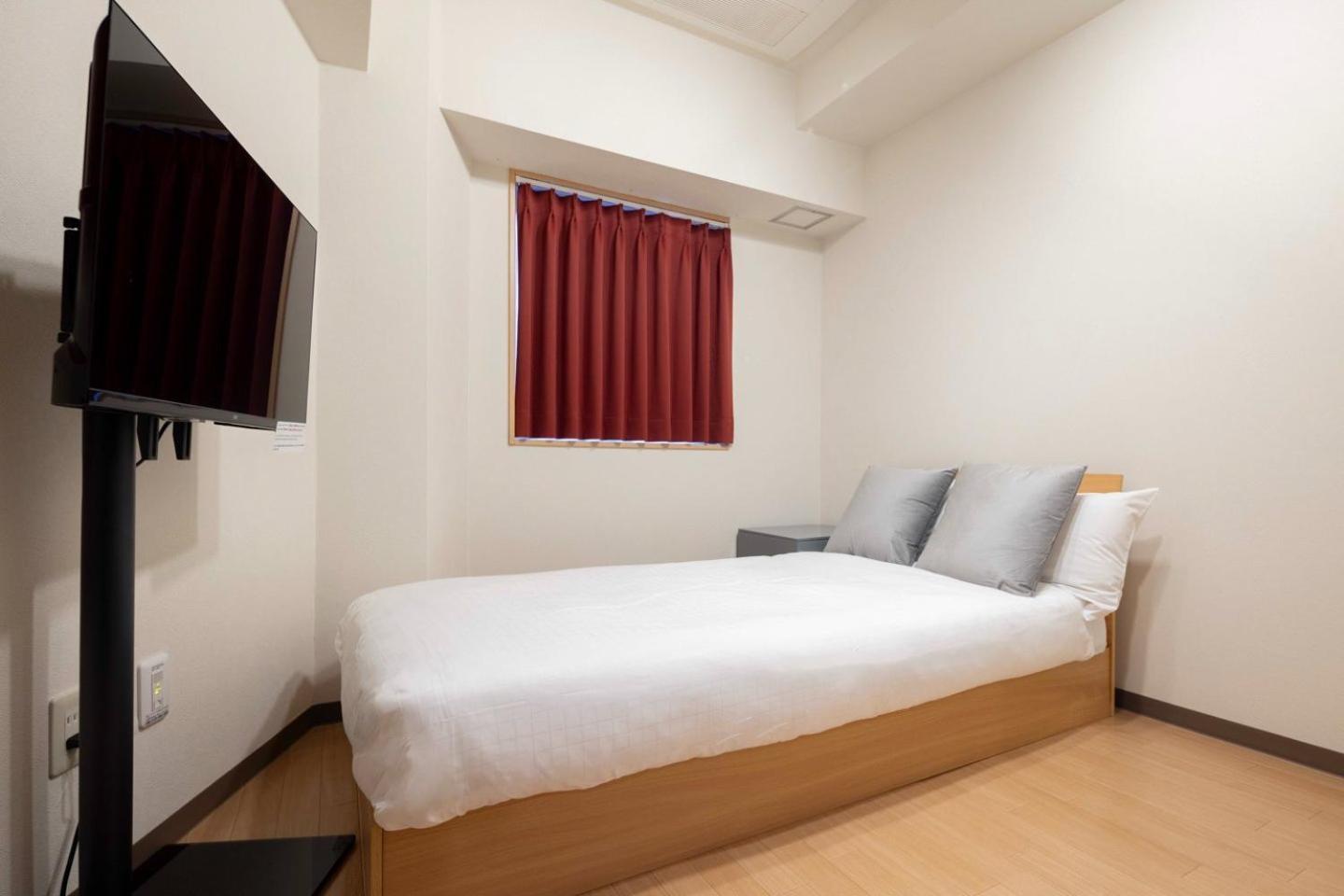 Shinjuku Okada Building Apartman Tokió Szoba fotó