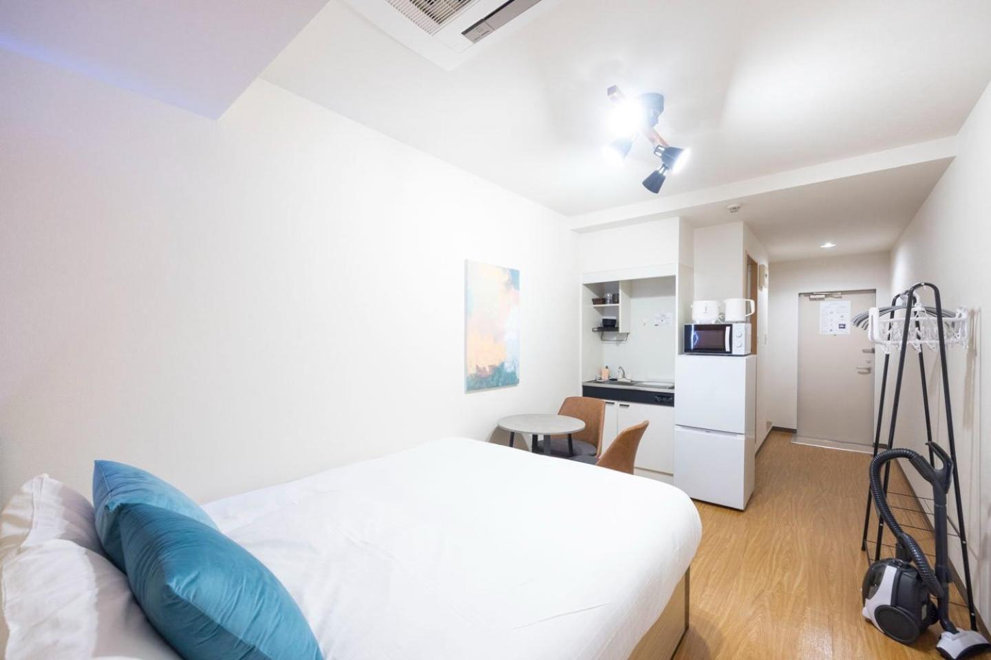 Shinjuku Okada Building Apartman Tokió Szoba fotó