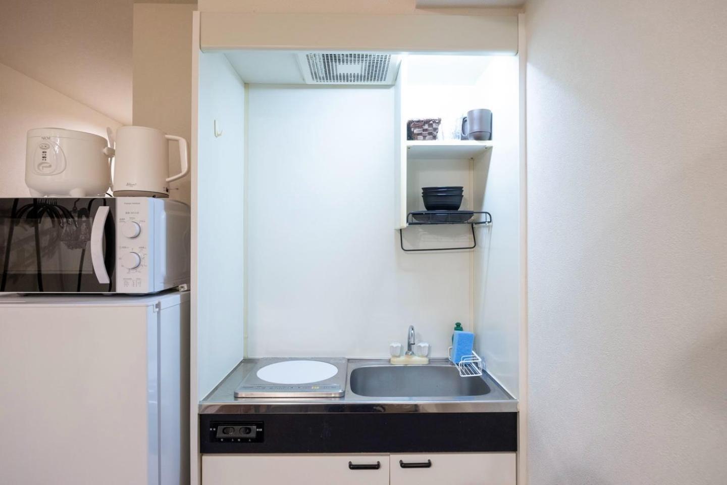 Shinjuku Okada Building Apartman Tokió Kültér fotó