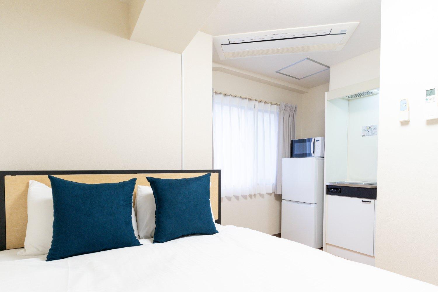 Shinjuku Okada Building Apartman Tokió Szoba fotó