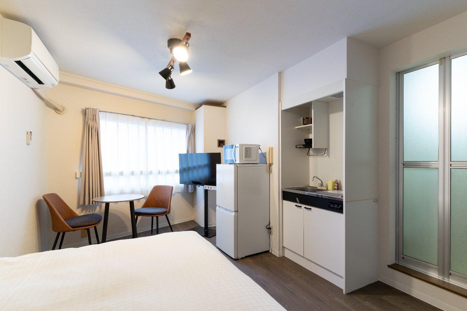 Shinjuku Okada Building Apartman Tokió Szoba fotó